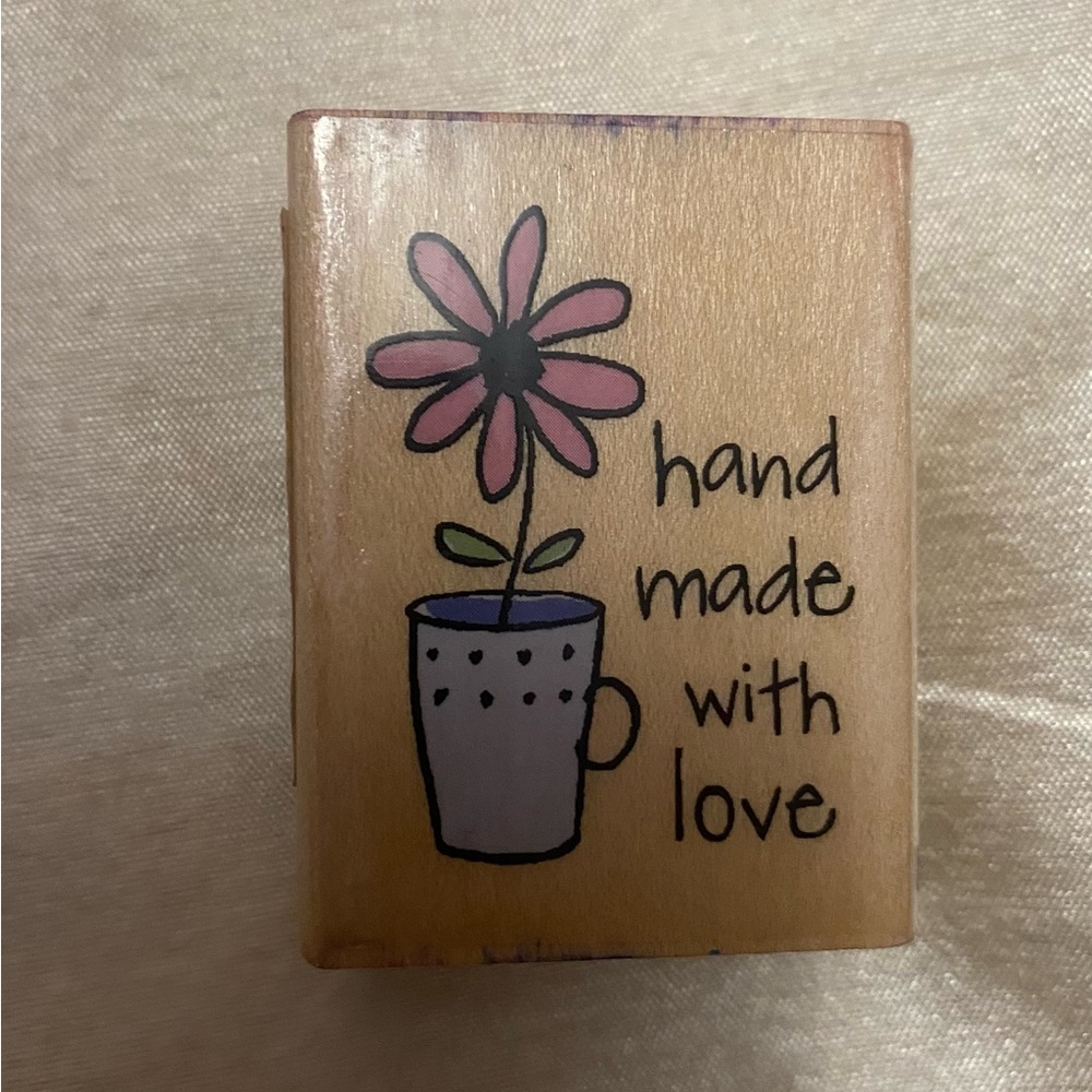 Wood mounted rubber stamp